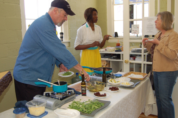 Lillie and Chef Joe serving up an easter feast at Monadnock Oil and Vinegar, LLC